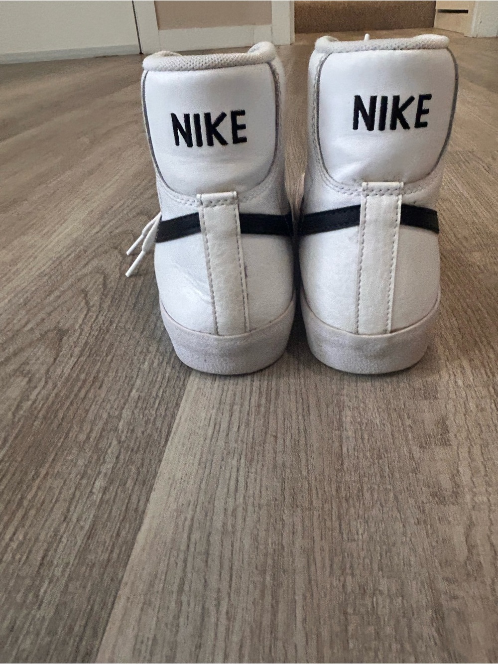 Nike Kids White High-Top Sneakers with Black Stripe
